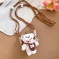 Detailed view of white plush bear charm featuring brown woven adjustable neck strap cord - White Bear with Coffee Rope / White