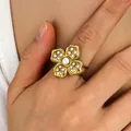 Vintage gold flower ring with pearls on finger, adjustable stainless steel jewelry piece - Pearl Floral Style (N-1111)