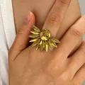 Vintage gold-plated sunflower ring for women, stylish niche stainless steel jewelry piece. - Sunflower Style (WG0-0633)