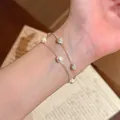 Elegante bracciale in argento a due strati con perle bianche e perline di cristallo al polso - Stile con Perline a Strati Argento-Rosa (HB7116)