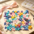 Detail view of colorful resin faux opal heart and star pendants for DIY jewelry - Mixed Shapes Style / Random Mixed Colors