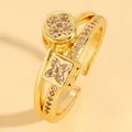 Close-up of gold stainless steel open ring featuring zircon-encrusted clover charms. - Double Layer Clover Square-Round Style (N-688) / Medium KC Gold (N-688)