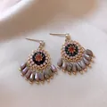 Close-up of ethnic glass tassel earrings with intricate beadwork and geometric charms - 2# Glass Tassel Geometric Style