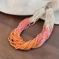 Handgefertigte mehrlagige Glasperlenkette mit leuchtendem Orange-Rosa-Weiß-Farbverlauf - Mehrlagig Perlen / Weiß-Rosa-Orange
