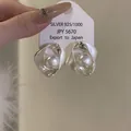 Boucles d'oreilles clous en perles argentées torsadées bijoux minimalistes mode - Style Rond Torsadé / Argent