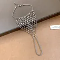 Close-up view of an elegant silver hollow mesh finger bracelet harness jewelry item - Light Luxury High-End Style (Style 2)