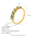 Detailed macro view of 18K gold-plated stainless steel ring featuring blue zircon stones - Gold - Blue Zirconia (R5675_GRB)