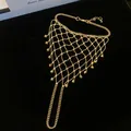 Close-up of an elegant gold hollow tassel slave bracelet featuring intricate mesh work - 1# Bracelet