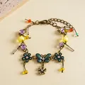 Vintage bronze flower butterfly bracelet with colorful resin beads and rhinestones - Gold-Multicolor