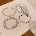 Detailansicht von 4-tlg. silbernen Armband-Set mit Herzperlen und Armreifen - Mehrfarbiges Herz 4-teiliges Set / Silber