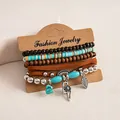 Close-up van een 6-delige boheemse kralenarmbandset met turquoise en zilveren bedeltjes - Bruin Zilver Blauw