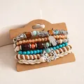 Detailopname van 6-delige etnische kralenarmbandset met Hamsa-hand en hoefijzerbedels - Zilver-Blauw