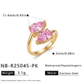 Detailed view of gold plated stainless steel ring with pink pear cut zircons - Pink