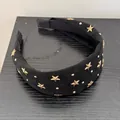 Elegante vintage zwarte stoffen haarband met gouden sterren en studs voor dames. - Zwart