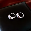 Detail showing silver 18K gold plated hoop earrings with inlaid oval zircon stones - Silver (White Gold Plated)