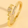 Detailed macro view of a gold-plated adjustable ring featuring Mom lettering and zircons - Mom Heart Zirconia Style (4184) / Medium KC Gold (4184)