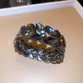 Macro view showing the elegant smoke grey marquise crystal wheat ear elastic bracelet details - Double Layer Wheat Ear Style / Gunmetal