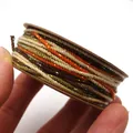 Nahaufnahme von 1,2 mm mehrfarbigem geflochtenem Baumwollfaden mit Goldakzenten für DIY. - Größe 4 Ca. 1,2MM 18M / Braun Orange Olivgrün Farbverlauf (C26)