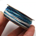 Detailansicht von 1,2 mm buntem, handgedrehtem Baumwollfaden mit metallischem Glitzer - Größe 4 Ca. 1,2MM 18M / Blau Weiß Farbverlauf (C53)