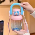 Gourde Tritan dégradée avec paille, poignée et bandoulière en rose et bleu - 830ml / Rose