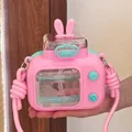 Pink camera-shaped rabbit water bottle for children featuring straw and strap - 600ml / Pink