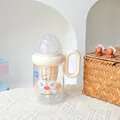 Kreative Tritan-Wasserflasche mit Griff, Design im Milchflaschen-Stil und süßem Gesicht - 380ml / SLB6118 Kunststoffbecher-Zwei Blinzeln
