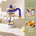 Blue 720ml glass water bottle featuring a sturdy handle, straw, and built-in tea infuser - 720ml (With Tea Infuser And Straw) / Yellow Blue
