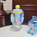 Detailed macro view of creative ice cream themed straw cup with adjustable blue shoulder strap - 880ml / Blue