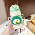 Zoom sur la gourde isotherme pour enfants avec étui dinosaure vert mignon - 500ml / Blanc