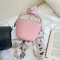Pink plastic water bottle with straw and adjustable pattern strap - 700ml / Pink