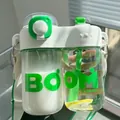 Gourde en plastique à double compartiment avec bandoulière verte et motif BOOM - 860ml / Blanc