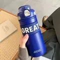Navy blue stainless steel insulated sports thermos bottle with white 3D GREAT text design - 575ML / Blue