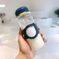 Modern glass water bottle featuring an insulated leather sleeve with a note label - 410ml / Insulated Sleeve Style / Dark Blue
