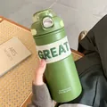 Portable green insulated stainless steel water bottle with straw and GREAT relief slogan - 575ML / Green