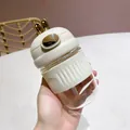 Bouteille en verre lapin mignon avec gaine en silicone isolée et paille pour filles - 350ml / Blanc