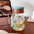 Portable glass water bottle with dual-drink lid and cute autumn star pattern - 450ml / Blue Brown