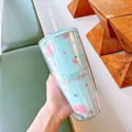 Close-up of a double-walled plastic tumbler featuring pink hydrangea floral patterns - 750ml / Blue