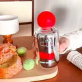 Gourde adorable en verre à effet miroir avec motif cerise et un bouchon sphérique rouge vif - 330ML / Rouge