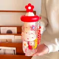 Cute floral glass water bottle for girls featuring a red flower lid and stylish beaded charm - 700ml / Red