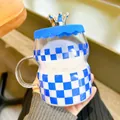 Detailed view of Klein blue checkered glass cup with a creative crown lid and handle - Green Plaid Style / 450ml / Plaid