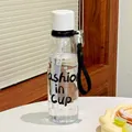 Transparent plastic straw water bottle with Fashion in Cup print and black strap - Fashion White (7150) / 700ml / White
