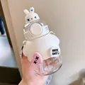 Cute white cartoon bear straw water bottle for kids with heart charm and portable strap - 730ml / White