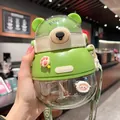 Cute green bear-shaped plastic water bottle for kids with straw and portable carry strap - With 3D Stickers (CH2316 Green+3D)