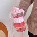 Detailed macro view of pink aesthetic plastic water bottle with straw and "OKAY" carry strap - 745ml / Pink