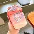 Close-up of a pink cartoon square straw water bottle featuring a cute rabbit sticker - 470ML / Pink