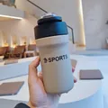Handheld cream-colored stainless steel sports bottle with straw and black lid - 500ml / Light Gray