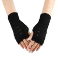 Detail view of black knitted fingerless gloves featuring an elegant hollow heart pattern design - One Size / Black