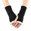 Detail view of black knitted fingerless gloves with cream lace trim and leaf pattern. - One Size / Black