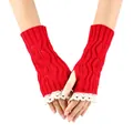 Close-up of red knitted fingerless gloves with white lace trim and leaf cutout design - One Size / Red