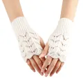 Detailed view of white knitted fingerless gloves featuring elegant hollow heart patterns - One Size / White